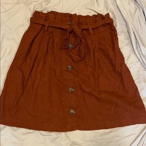Maroon/rust colored button front skirt